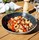 Cylindre de cuisson pour barbecue RollGrill de marque Cookut